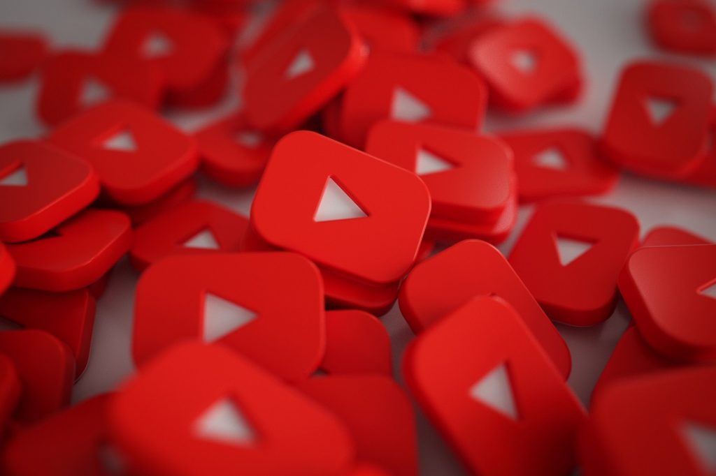 How does YouTube's advertising and marketing system work?